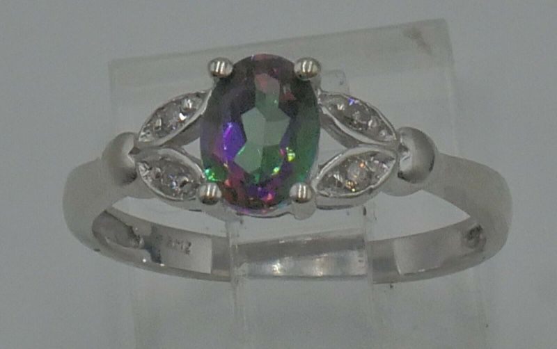 14kt white gold fashion ring with oval multi color stones with 4 diamonds 2.2 gr size 7.25 pre owned  834555-2. 