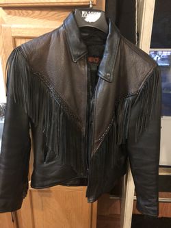 ladies brown and black leather jacket and chaps