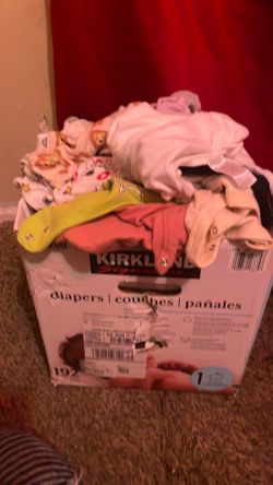 Box of baby clothe