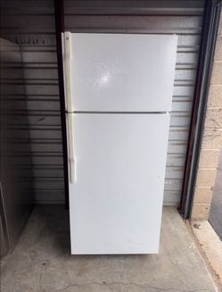 White GE Refrigerator And Freezer