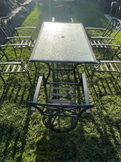 6 chair glass top patio table