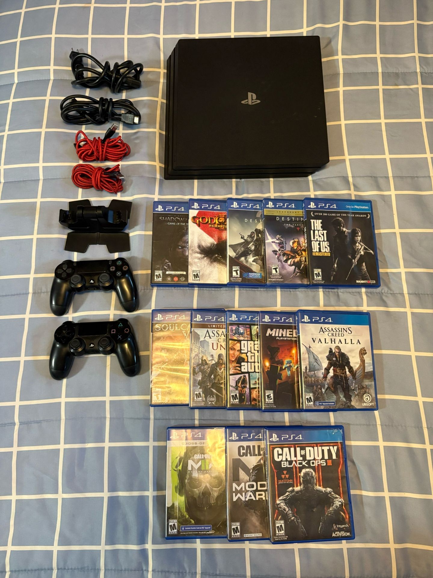 Used PS4 Pro 1TB Bundle: 2micro USB, HDMI, Power cord, 2 Controllers, Charging Stand, 13 Games