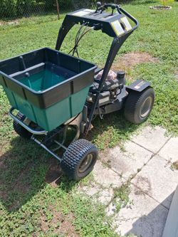 Ride on spreader