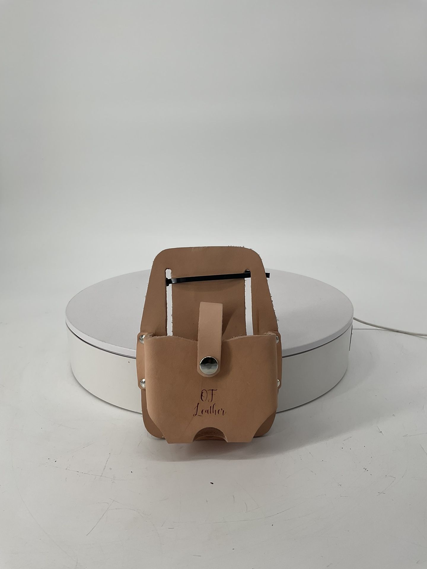 OF LEATHER TAPE HOLSTER