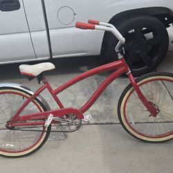 Red adult beach cruiser bike