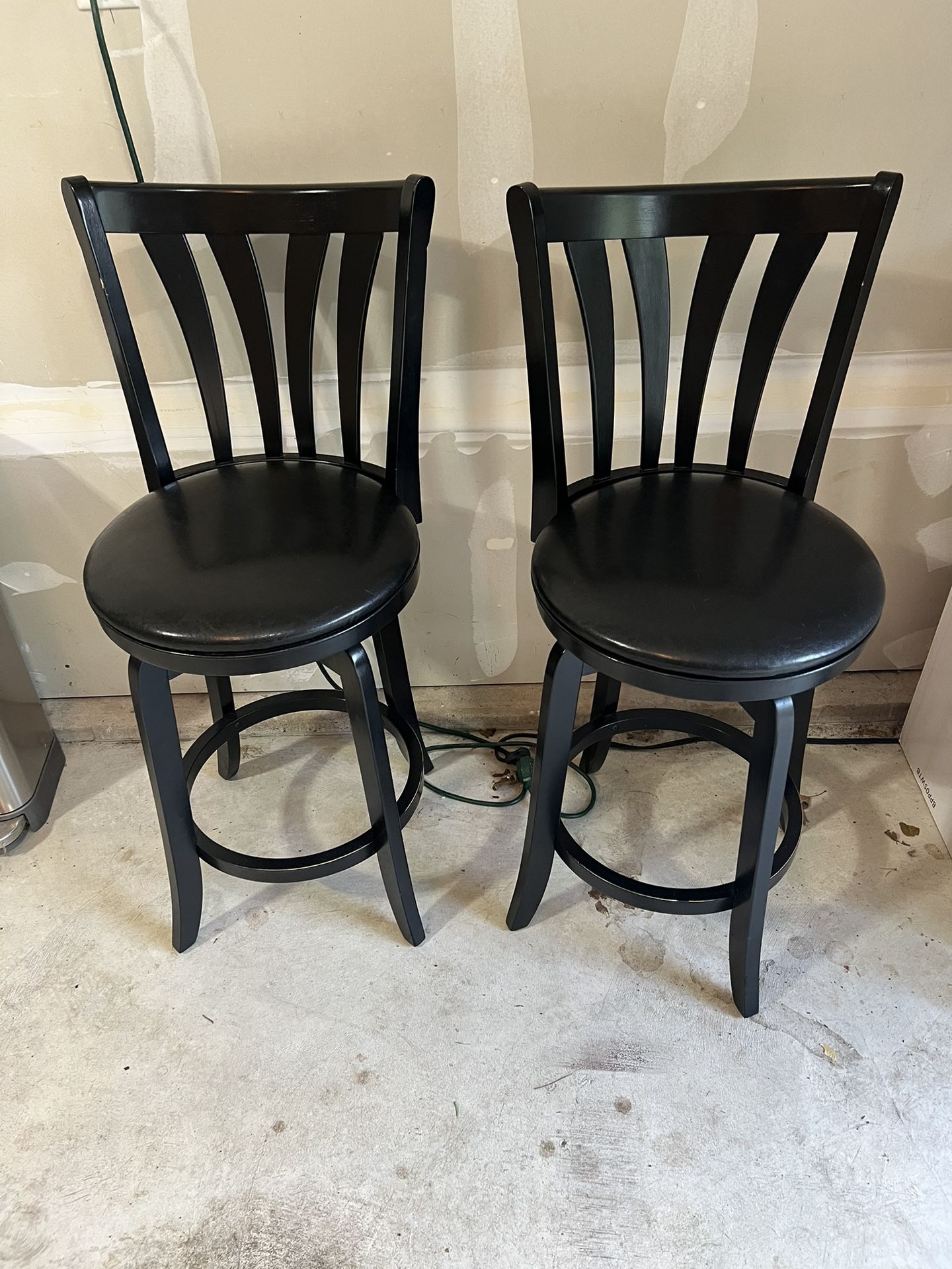 Pair Of Black Swivel Bar Stools