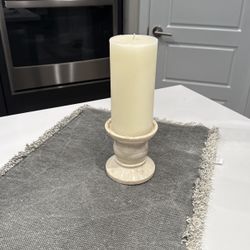 Decorative candle on marble base
