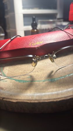 C De Cartier rimless glasses