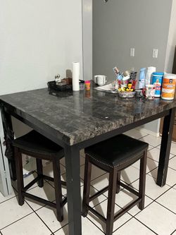 Table with bar stools