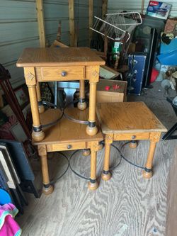 Set of 3 tables each one is 23 inches tall and 22 by 24 inches across the top