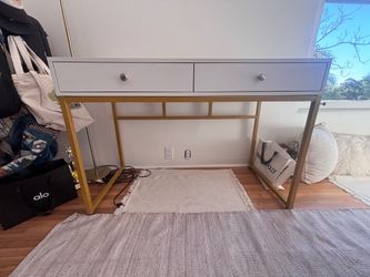 white vanity/desk with gold legs