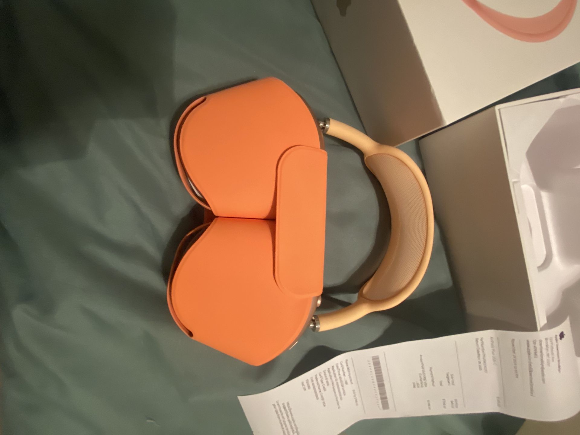 Orange AirPod Pro Maxes 