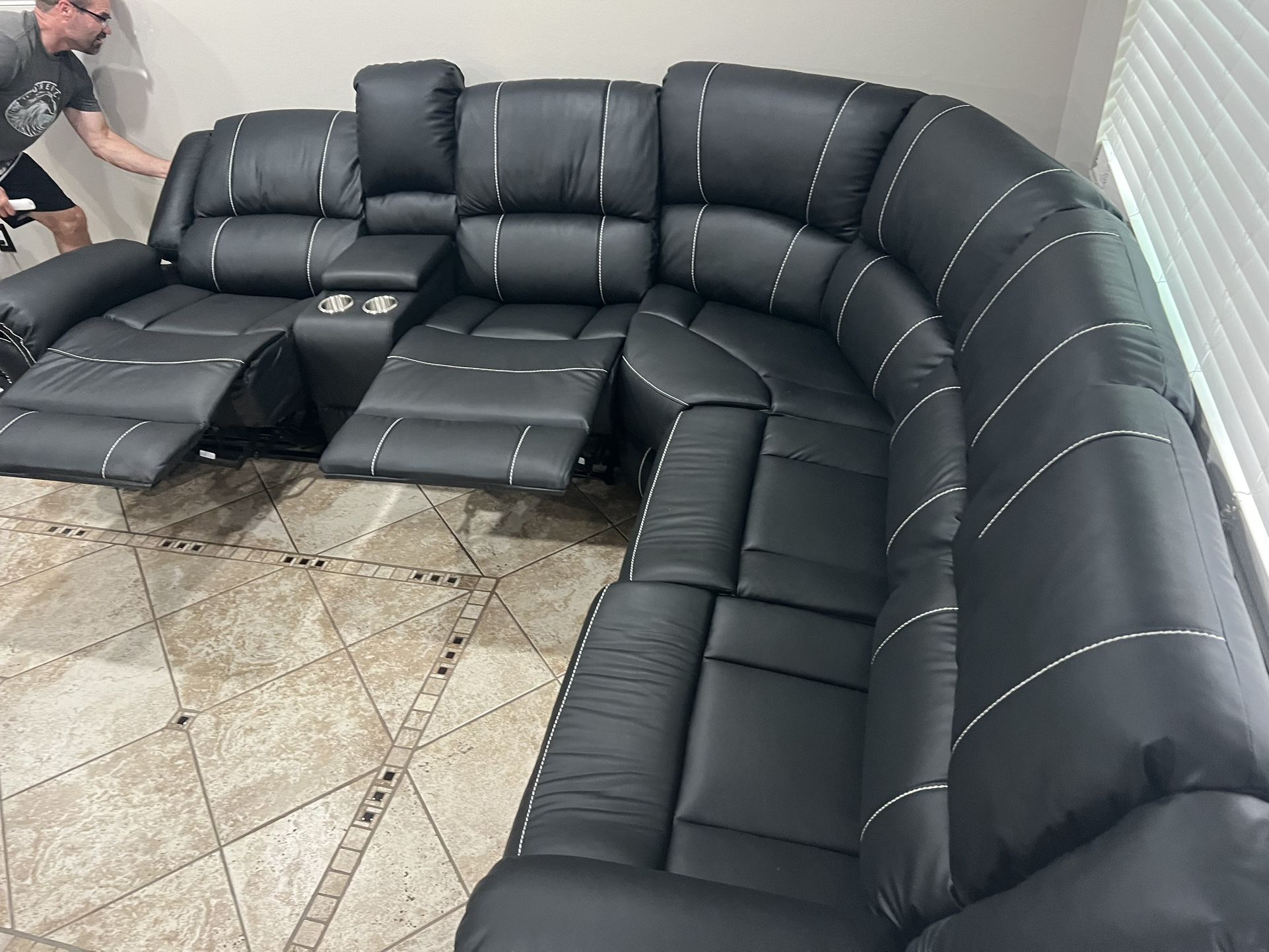 New 3 Reclining Power Sectionals.  Black Leather.  116x104x41H.  Free Delivery!