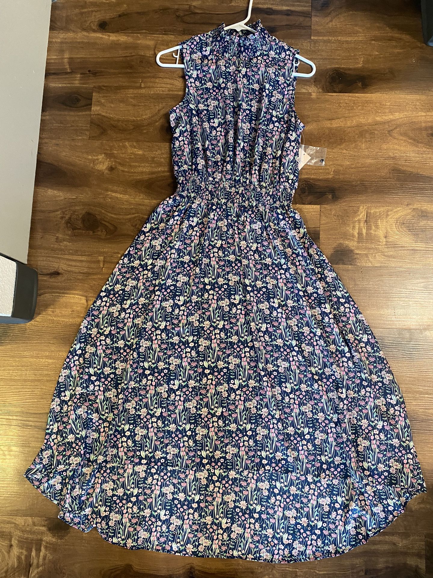 Brand new woman’s Nanette Lepore brand high low sleeveless purple floral dress up for sale