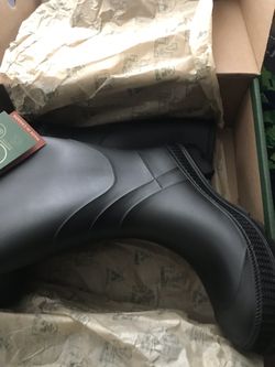 New rain boots. PRICE $25
