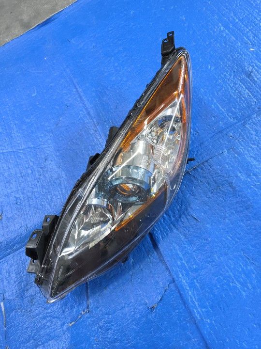 2012-2013 LEFT DRIVER SIDE HEADLIGHT ASSEMBLY FOR  MAZDA 3 TYC 20-9086-91-9 .