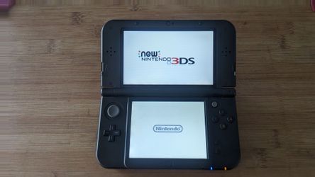 new Nintendo 3DS XL - black with instructions booklet