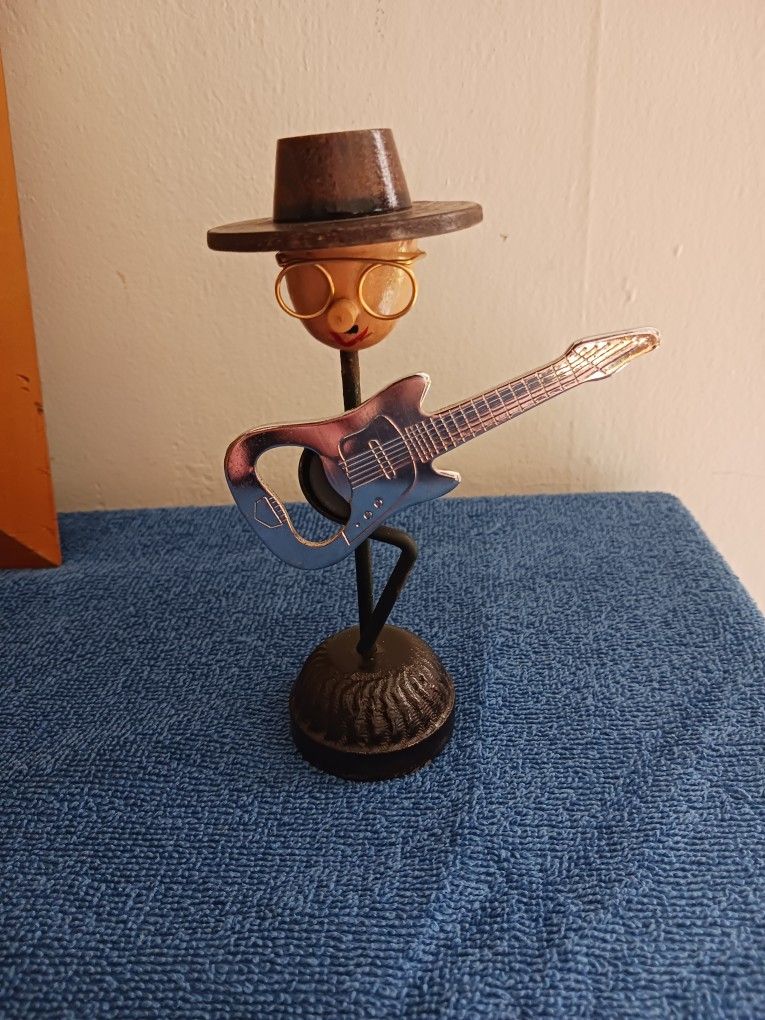 Vintage Bottle Opener,Man Play A Strat Guitar