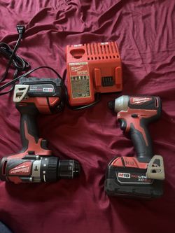 Milwaukee Drills And 2 M18 With Charger