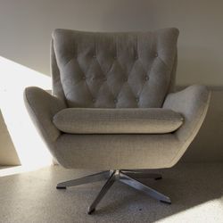 Wells Petite Upholstered Tufted Swivel Armchair