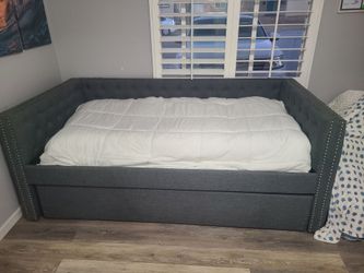 Twin trundle pullout bed with 2 twin mattresses 250 or best offer