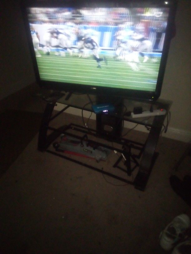 50 in TV Plus stand $100