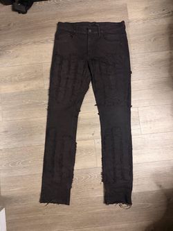 KDNK black distressed stacked jeans with frayed patches, size 34 #distressed #denim #kdnk