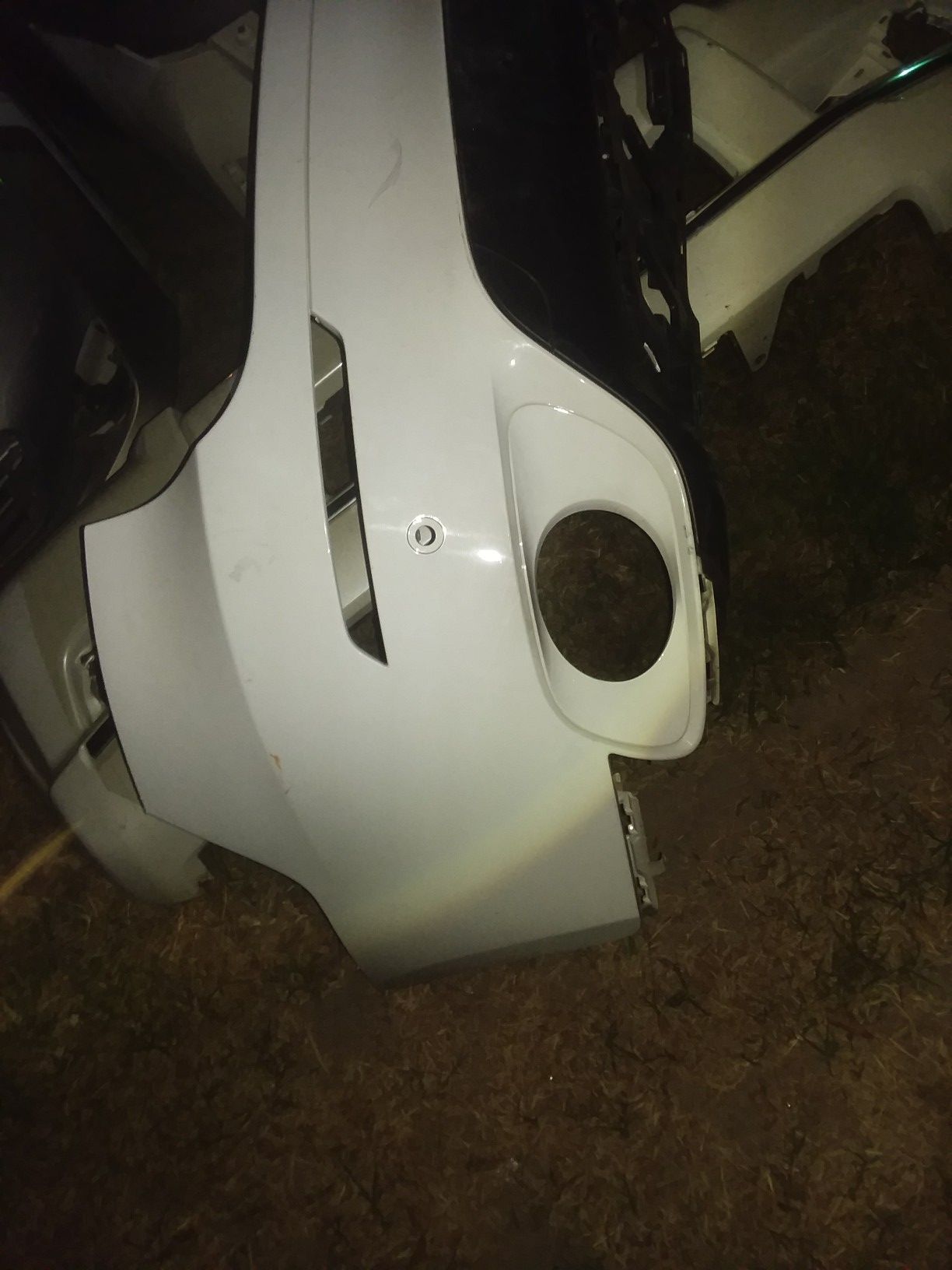 2010 TO 13 BMW X 5 REAR BUMPER COVER WITH LOWER GROUND EFFECT.