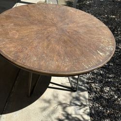 Free 45 inch round wood table with iron legs 