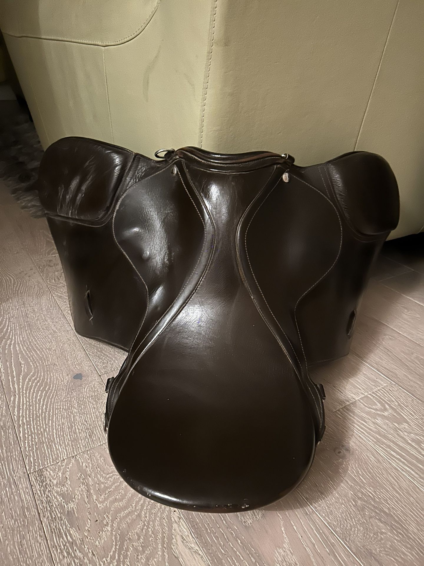 Custom brown leather horse saddle used in good condition