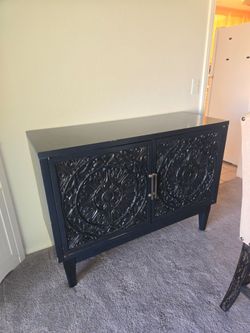 Black Two-Door Accent Cabinet with Carved Doors