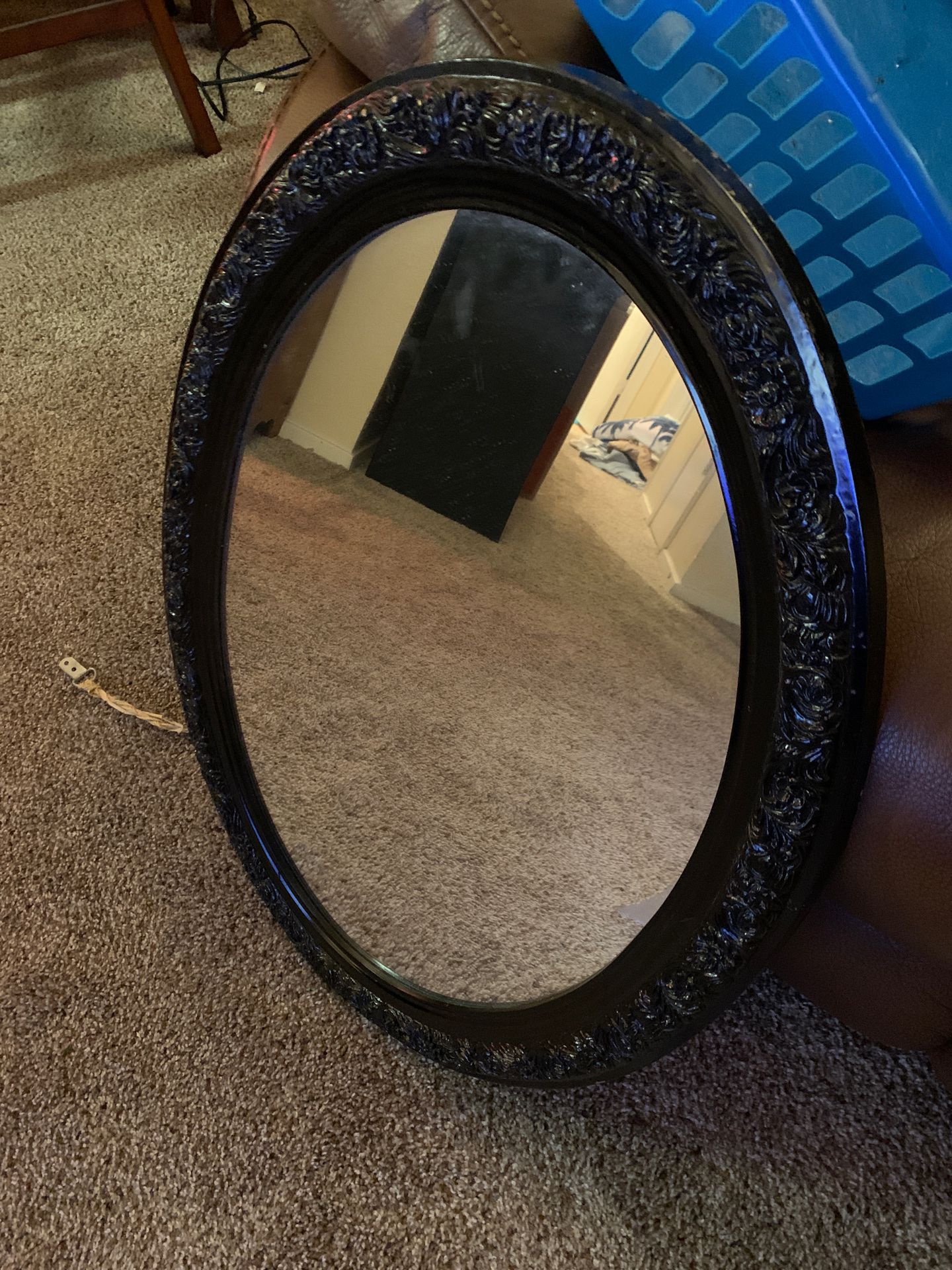 Oval black mirror
