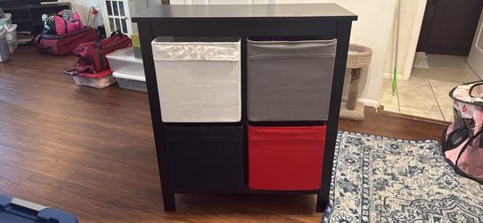 4 storage cabinet with bins included