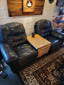 Reclining leather chairs with center table