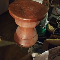 Red wooden stool