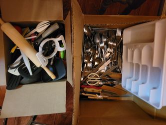 Kitchen ware, lots of flatware and kitchen utensils