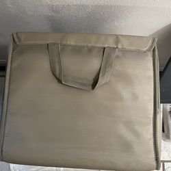 COMPUTER BAG, BEIGE  13 1/2”w x 12”, cross streets are Arapaho & Waterview 