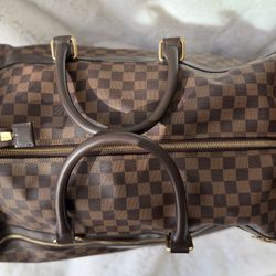 Louis Vuitton Eole 50 rolling luggage bag in the Damier Ebène canvas