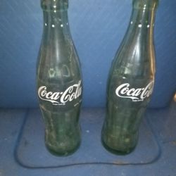 Three Antique Coca-Cola Bottles