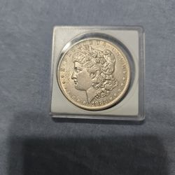 1883   O    Morgan Silver Dollar. 1 Ounce