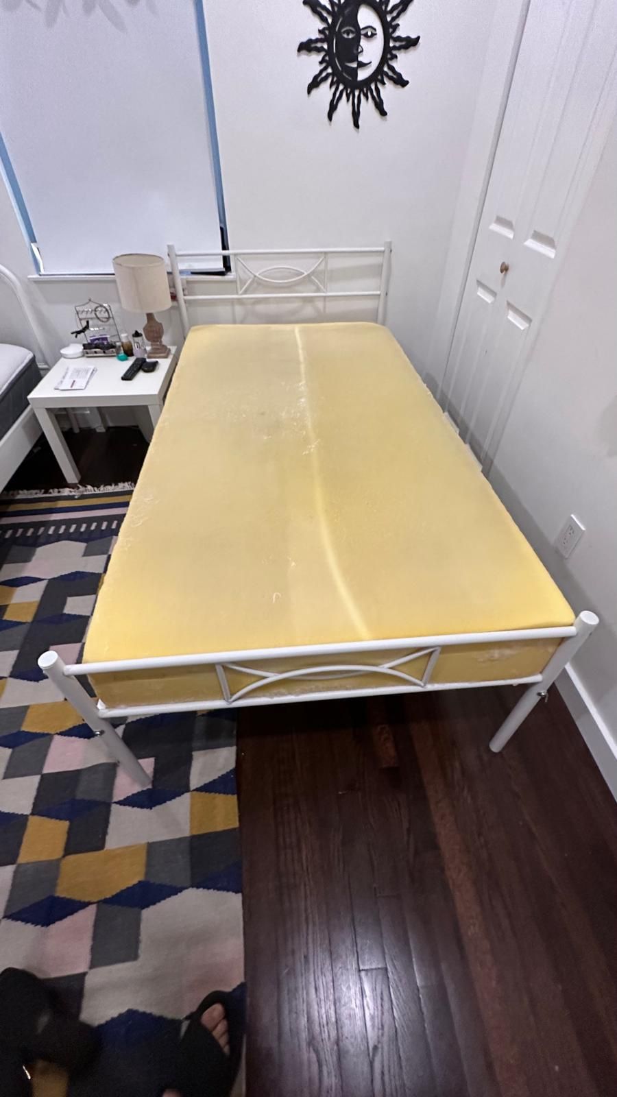 Two Twin Beds Plus The White Mattress.  