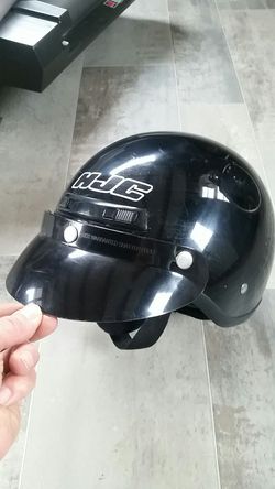 Black motorcycle helmet HJC