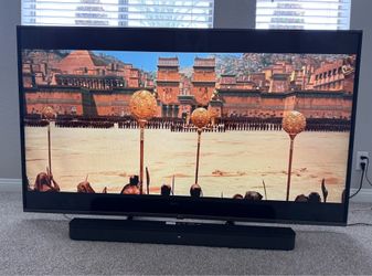 LG TV with Sony HT-SC40 soundbar and remote