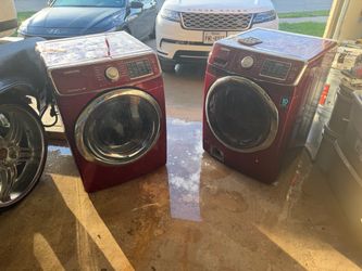 Samsung burgundy/red front-load laundry machines.