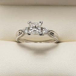 1.02 carat center stone emerald cut engagement ring