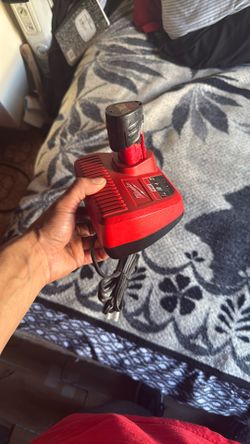 Brand New Milwaukee M12 Charger And Used M12 Battery