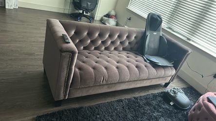 Purple velvet sofa