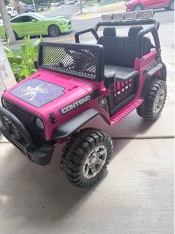 Pink battery powered jeep with music