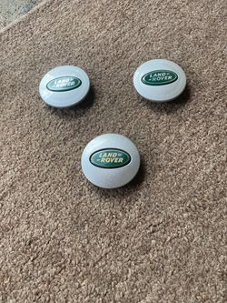 Range Rover sport wheel center caps , 2 new/ 1 used