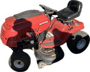 Yard Machines 42” cut Lawn tractor w/ free chainsaw & gas can***$325 or best offer***